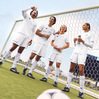 Team White soccer players in coordinated white uniforms