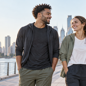 Three adults wearing unbranded casual apparel in an urban setting
