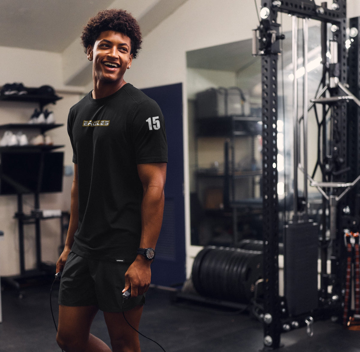 Athlete in black team apparel in a training setting