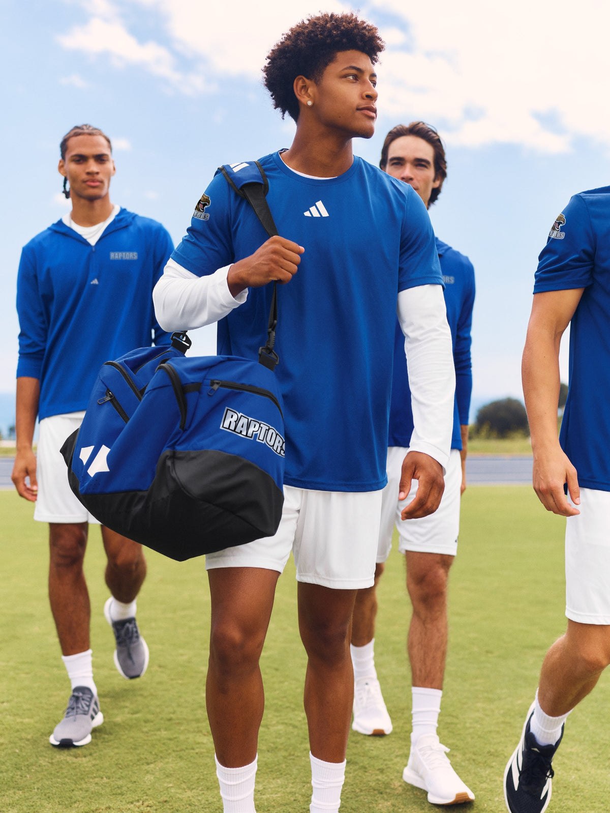 Athletes wearing royal-blue team apparel