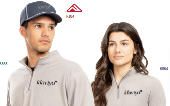 A man in a blue cap and a woman wear light gray Klaviyo-branded MICRO-LITE FLEECE 1/4 ZIP PULLOVERS made from Eco-Revive recycled polyester. Product codes 5863, 6864, and P304 are displayed near them against a white background.