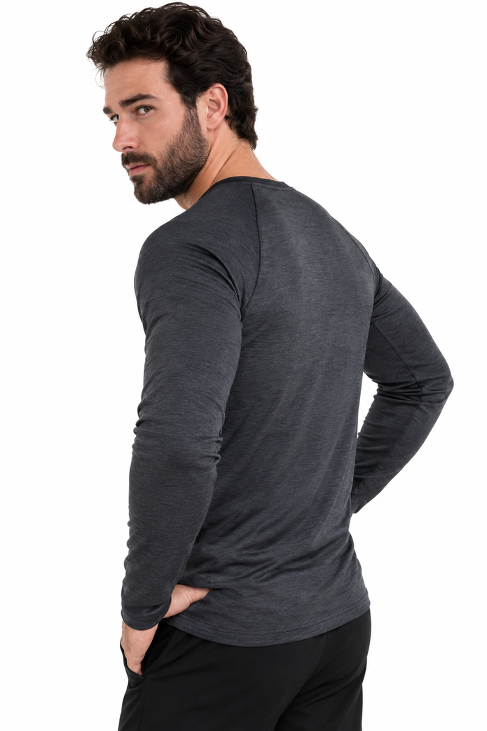 Back view of model wearing the All-Pro Eco-Revive Long Sleeve Performance Tee