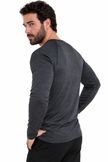 Back view of model wearing the All-Pro Eco-Revive Long Sleeve Performance Tee