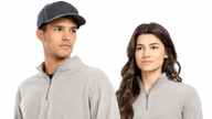 Two models wearing light gray Micro-Lite quarter-zip fleece pullovers