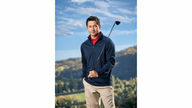Nike Golf half-zip cover-up on a golfer on the course