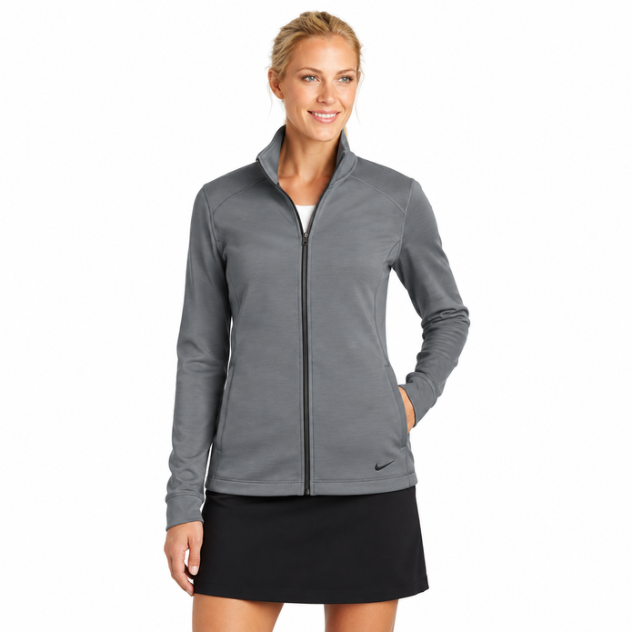 Front view of model wearing gray Nike Therma-FIT jacket