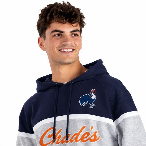 Model wearing navy and gray United Athletic fleece hoodie with orange Chad's graphic